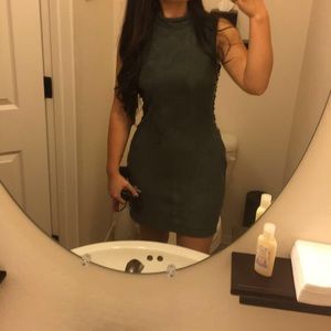 Dark green dress laced up on sides